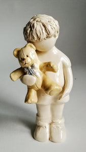 Little Boy holding Teddy