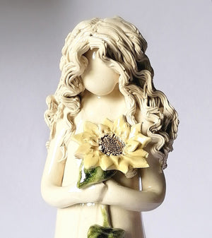 Medium Slender Lady holding a Sunflower